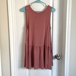 Coral sleeveless ruffle hemmed tunic